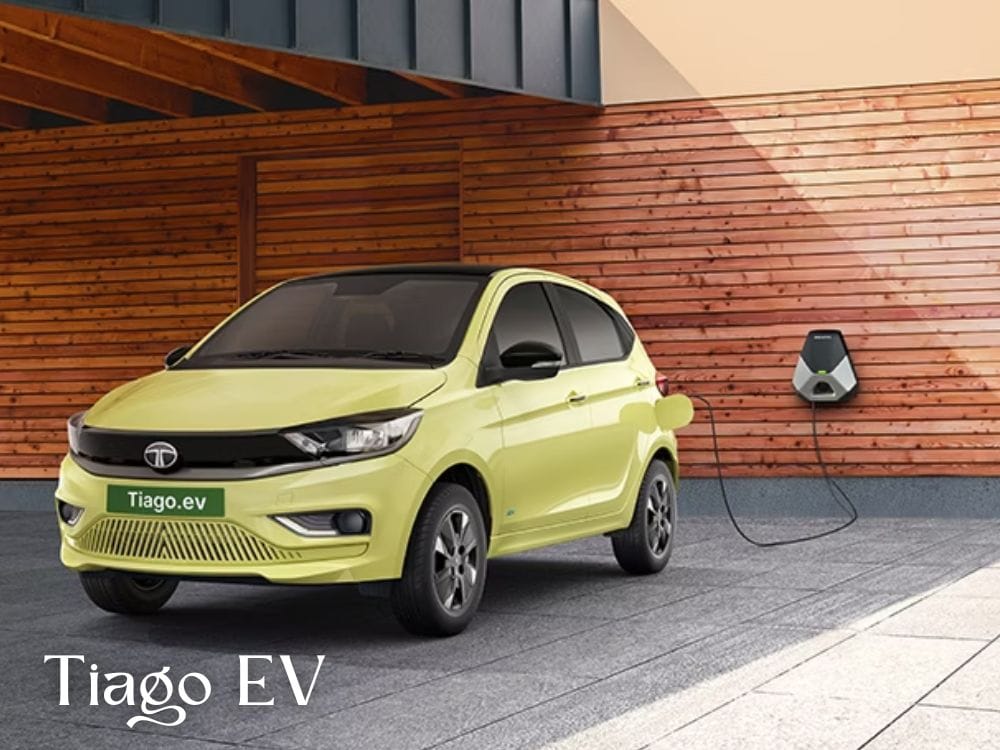 yellow coloured Tata Tiago EV being charged