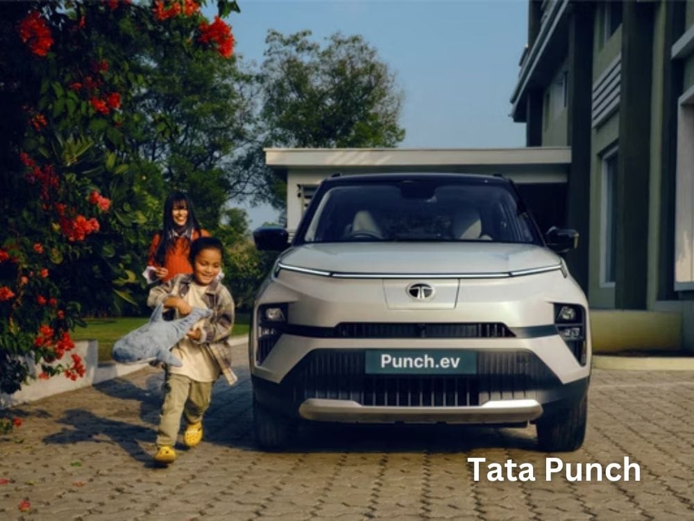 2 kids playing near tata punch ev 